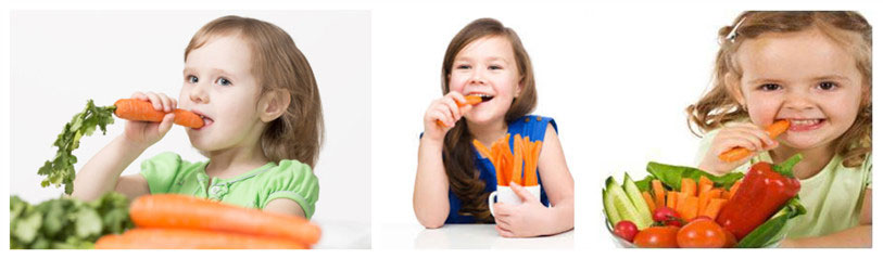 girls eating carrots